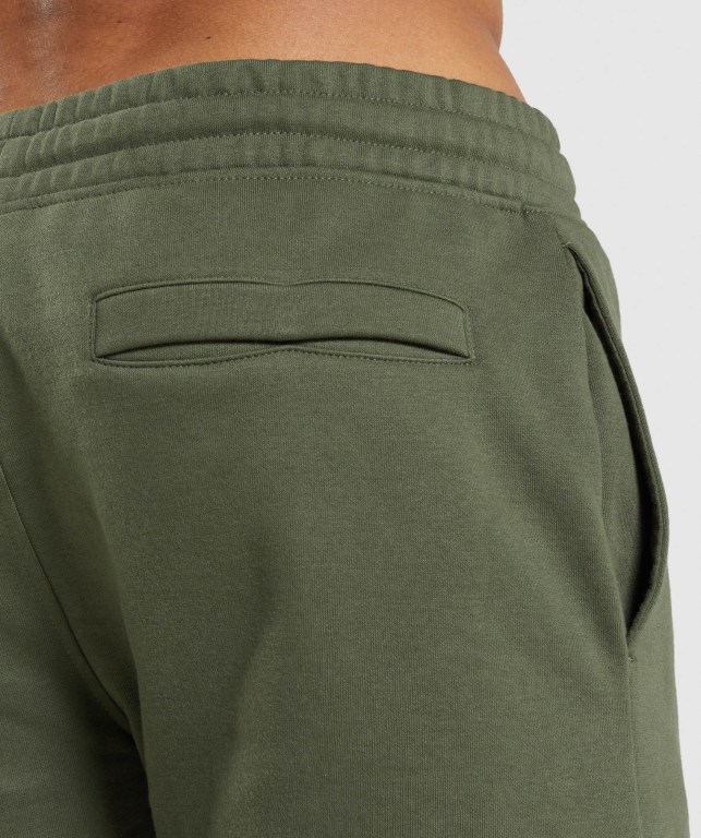 Bermudas Gymshark Crest Hombre Verde Oliva | OkqUgxvzfDu